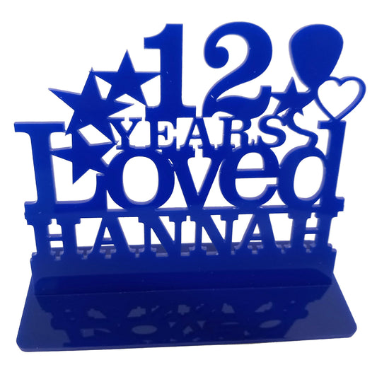 Personalised 12th birthday gift featuring the Years Loved birthday design theme. This present is an acrylic keepsake ornamental plaque.