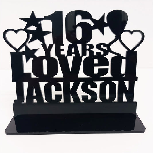 Personalised 16th birthday gift featuring our Years Loved birthday design theme. This present is an acrylic keepsake ornamental plaque.