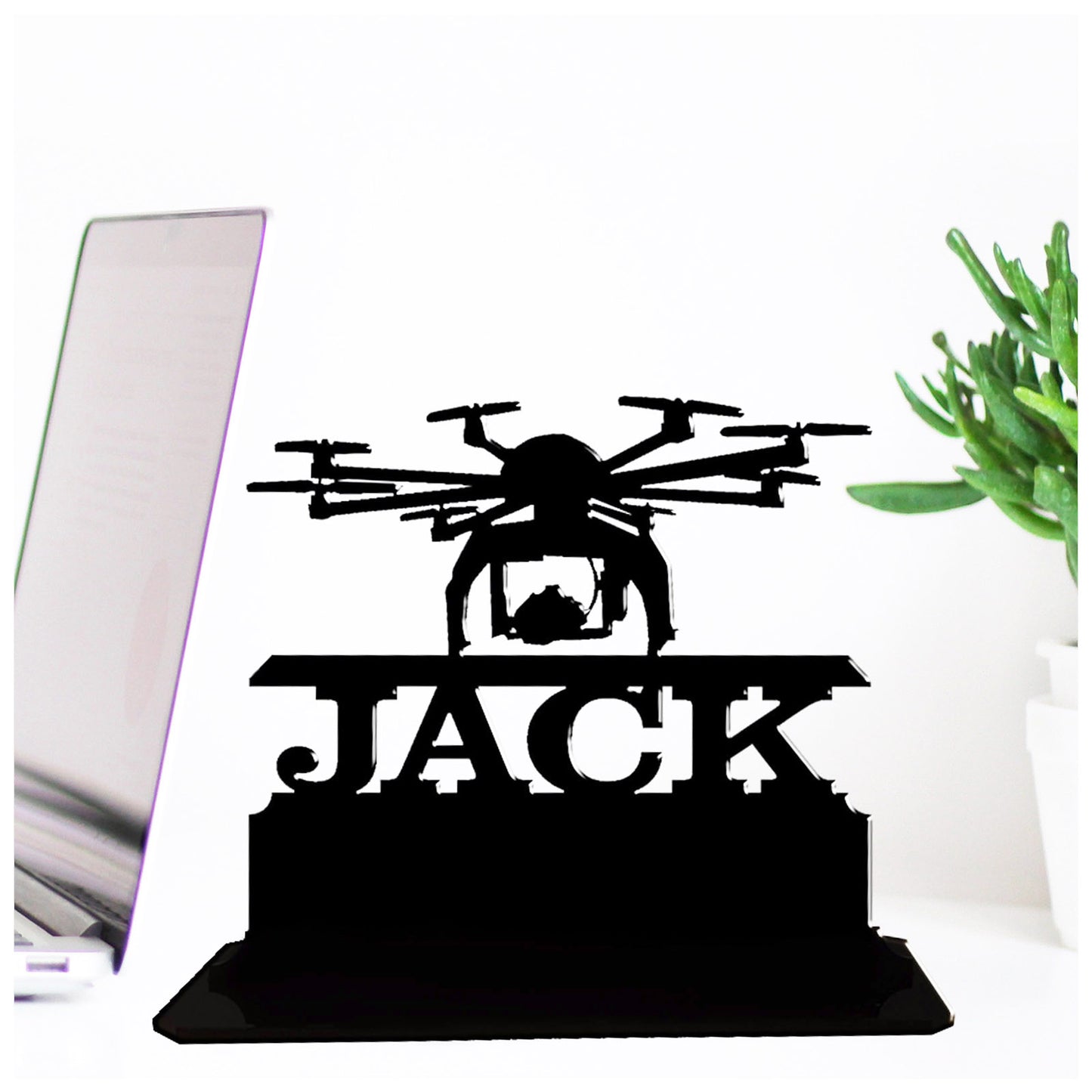 Personalised unique acrylic quadcopter drone gifts. This standalone present is a keepsake ornamental plaque.